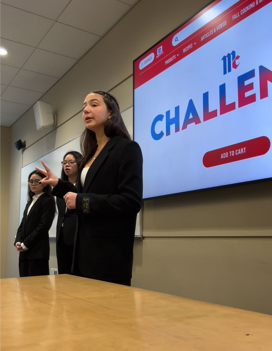 A student practices their presentation