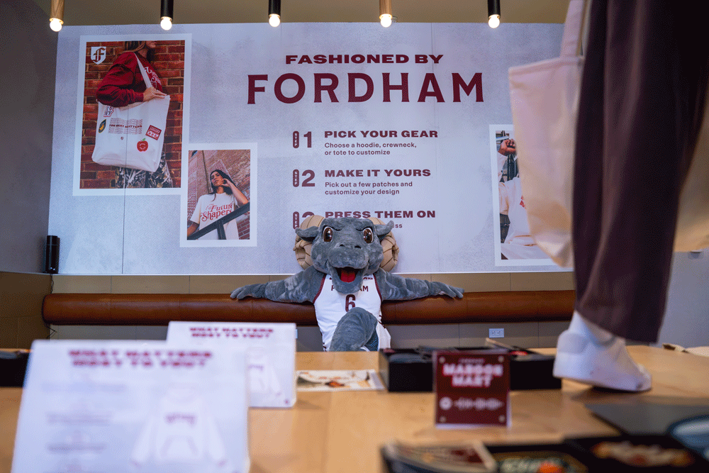 Ramses relaxing in Fordham's speakeasy fashion boutique at NACAC