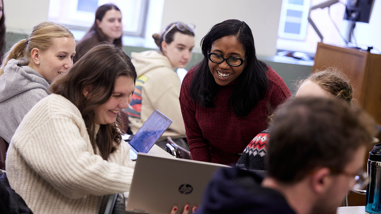 Brandy Monk Payton participates in a group discussion with students.