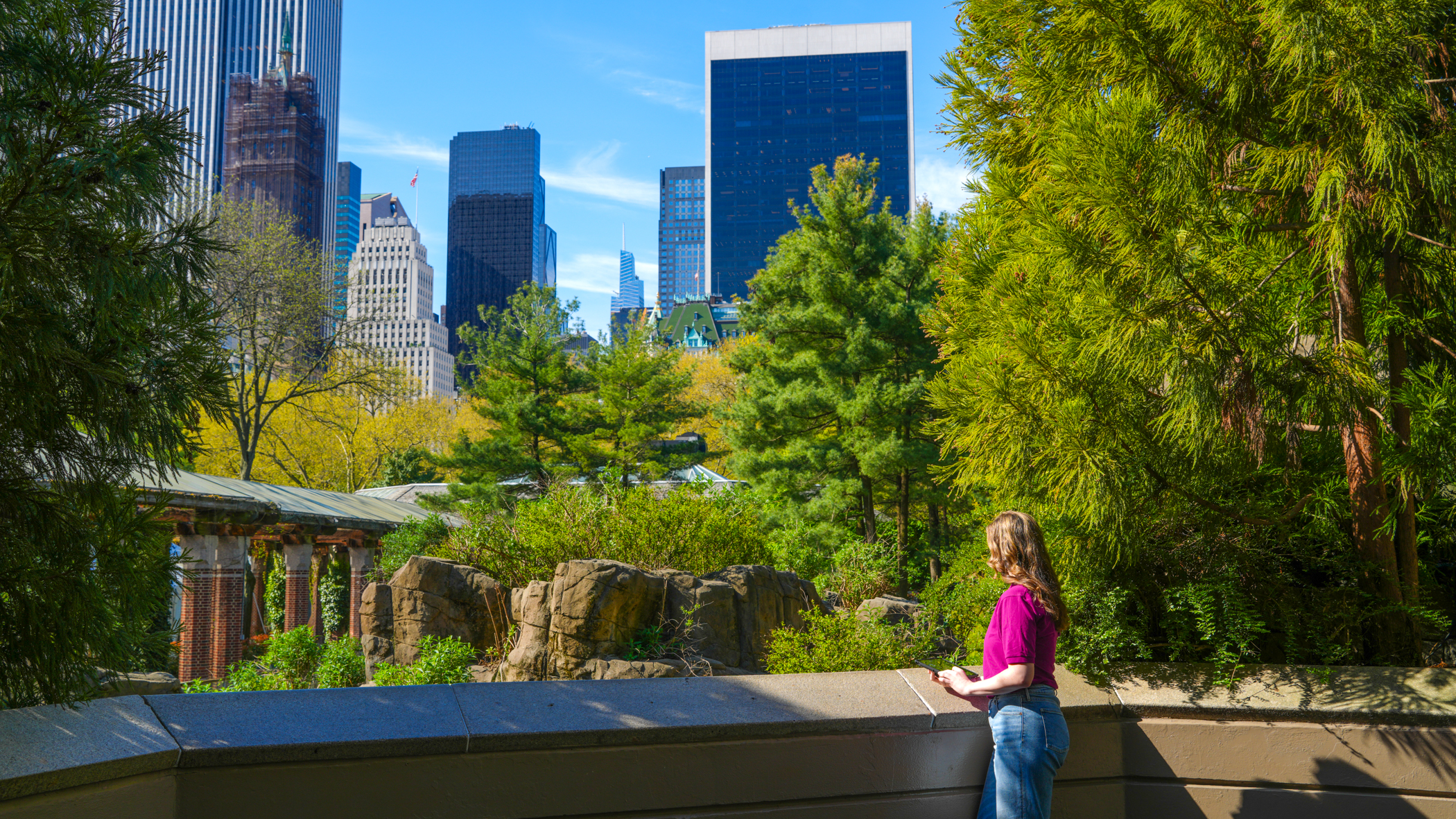 Shannon observes the monkey exhibit.