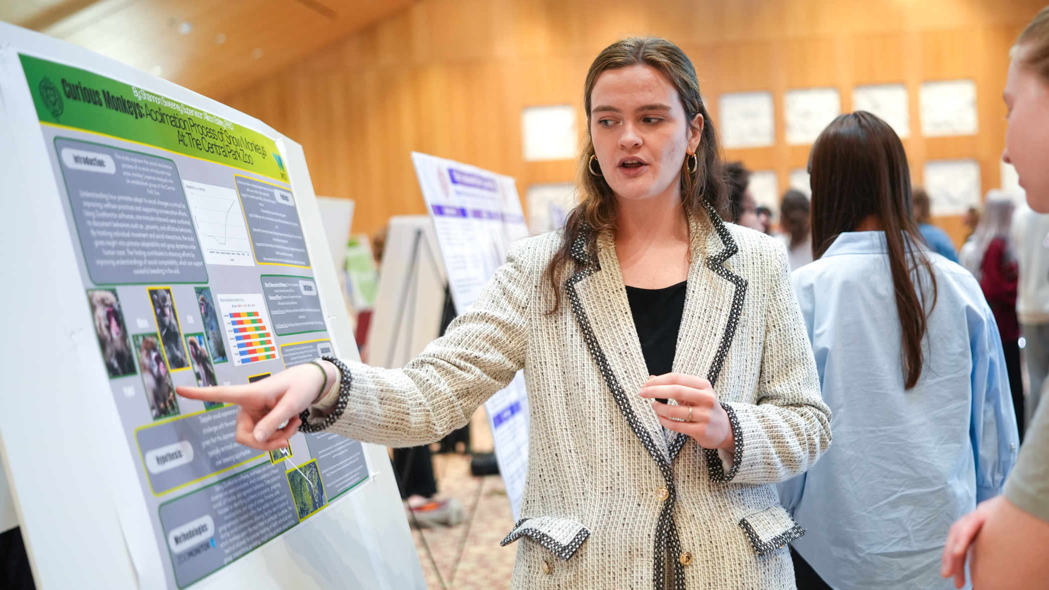 Shannon presents her research poster.