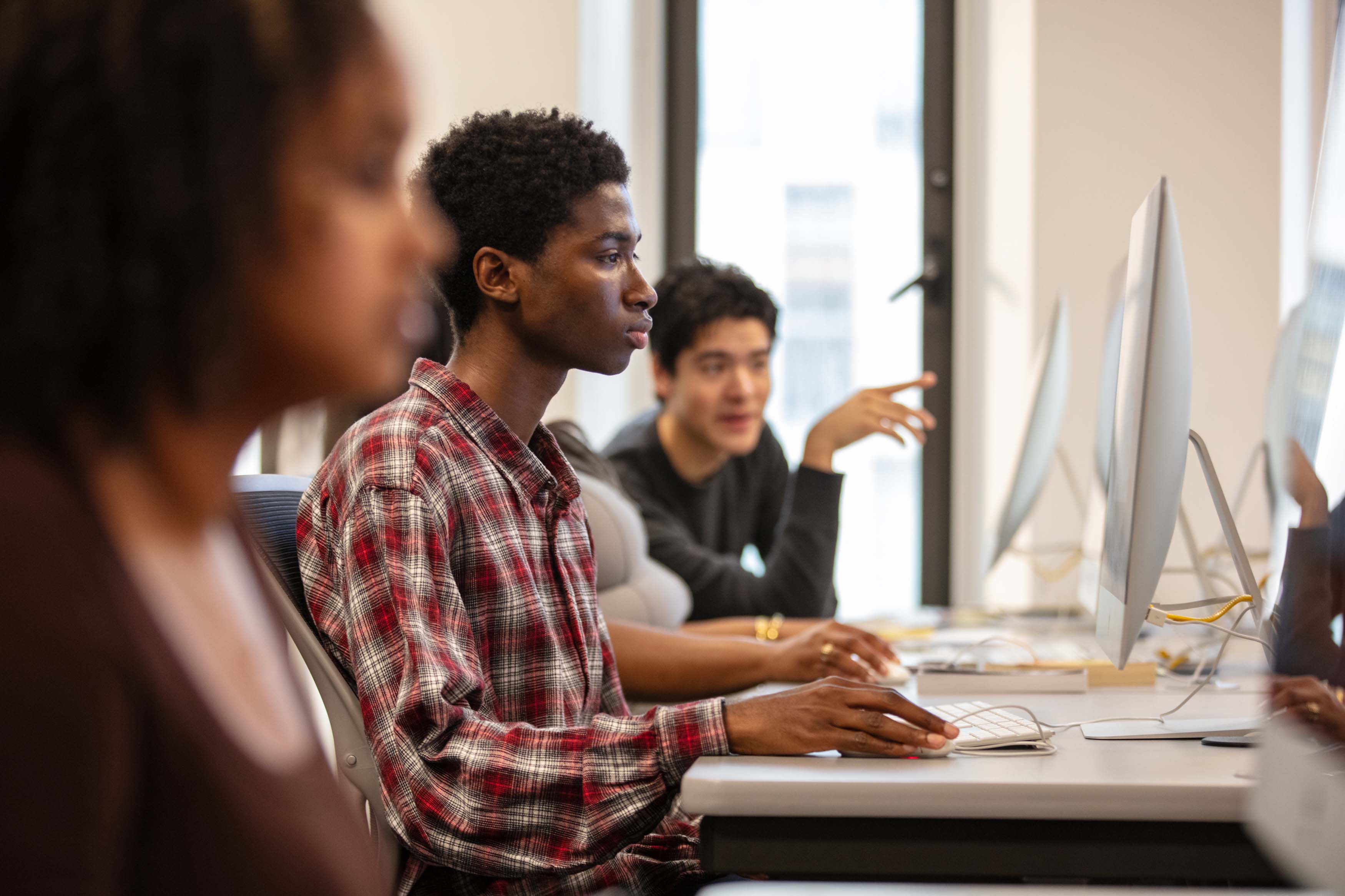 students on computers in classroom