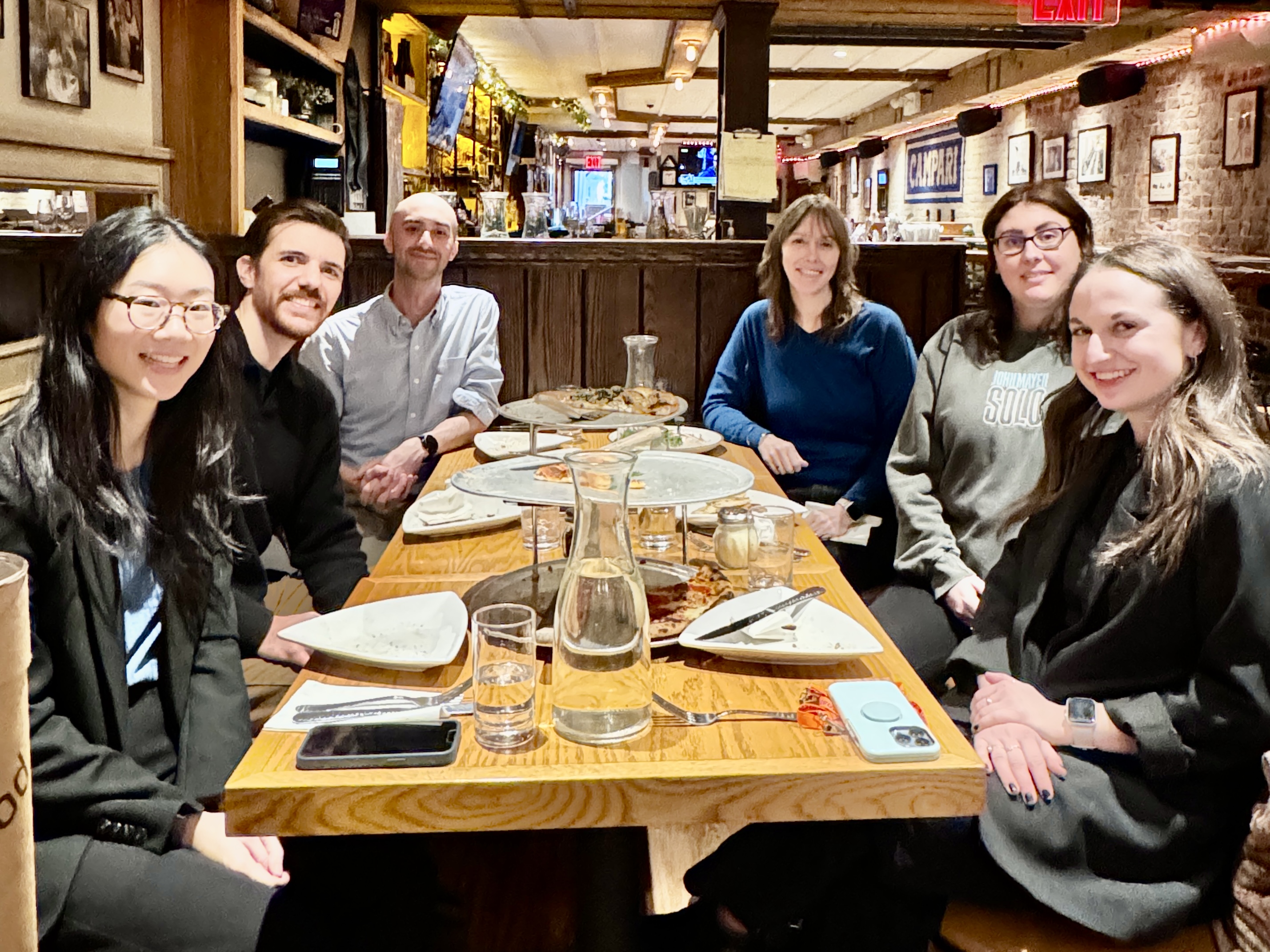 Researchers having dinner at the International Neuropsychological Society Annual Meeting 2024