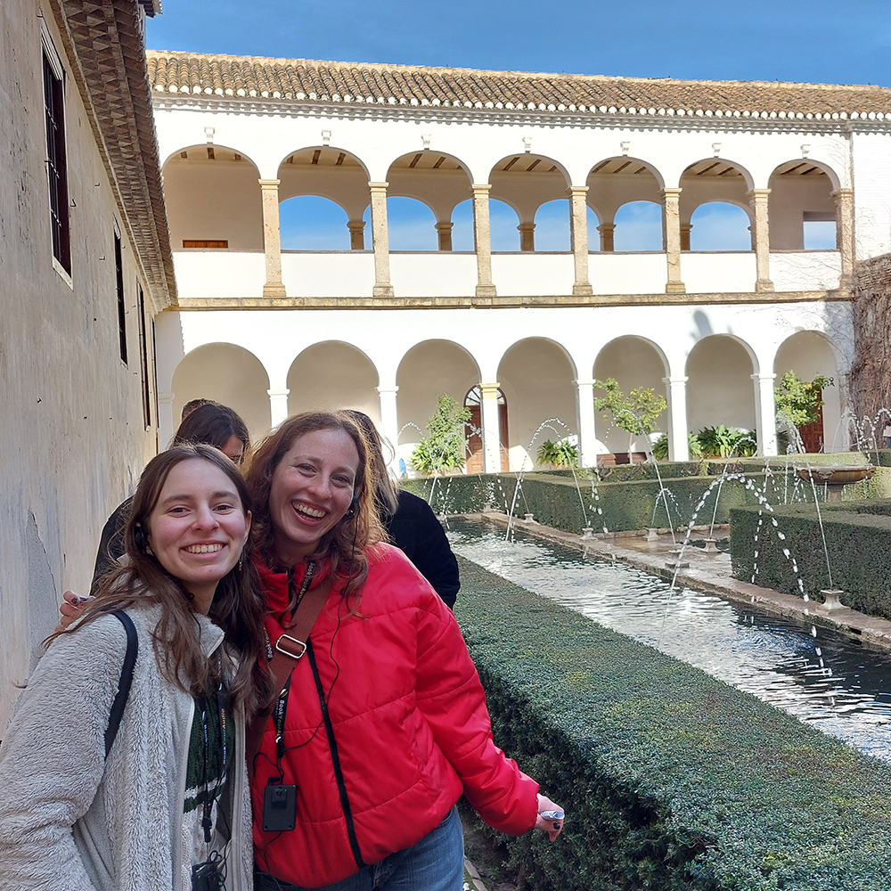 Students stand in front of Alhambra