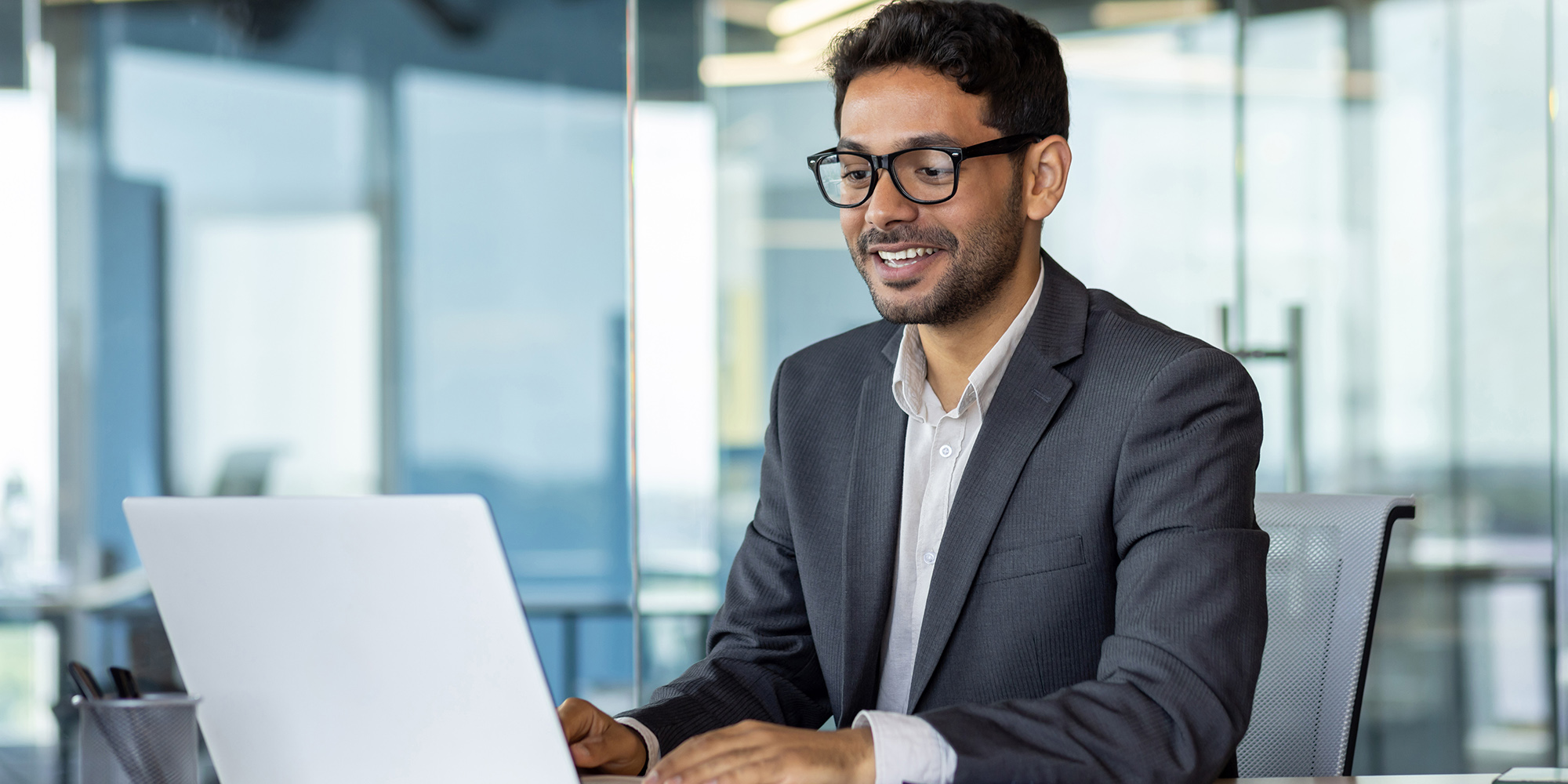 Manager Working on Laptop