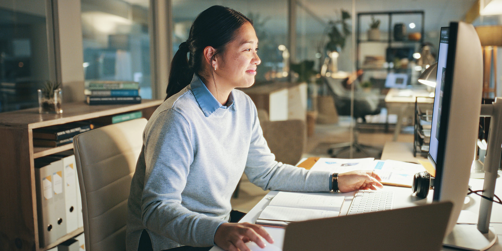 Woman in Office at Computer