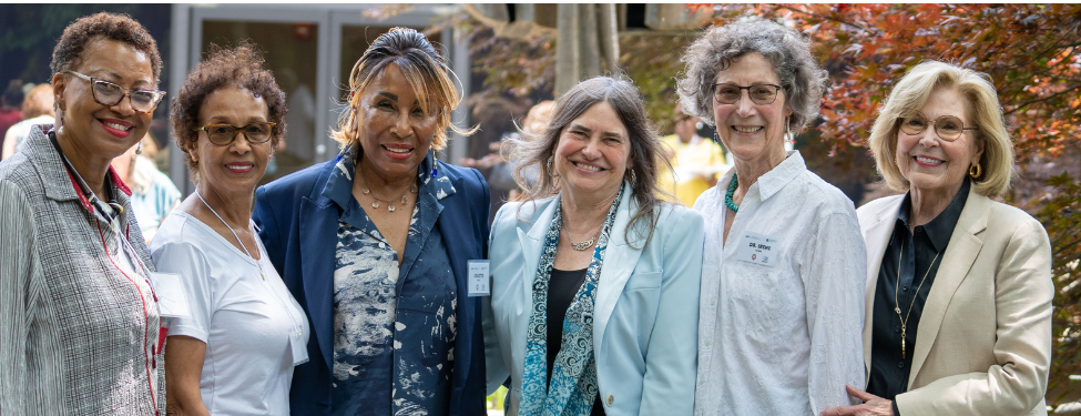 Members of the Henry C. Ravazzin Center pose in the Westchester campus courtyard.