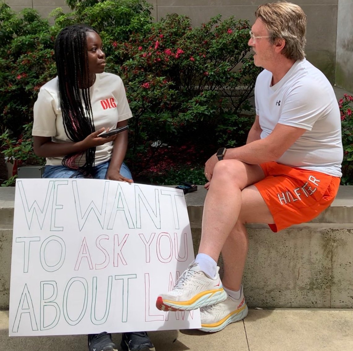 DLG Student with Sign